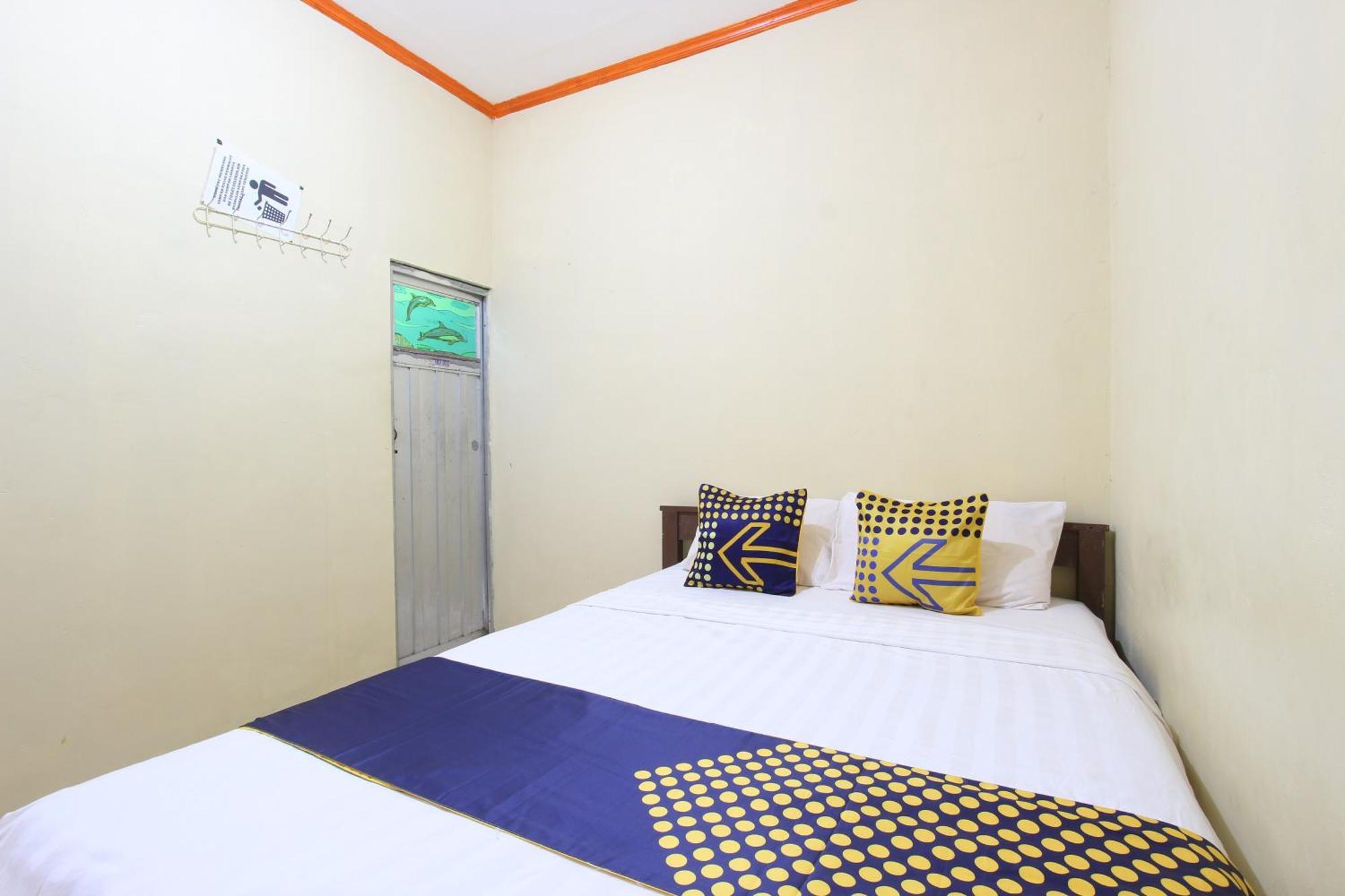 Oyo 92231 Penginapan Tanjung Alang Syariah Macáçar Exterior foto